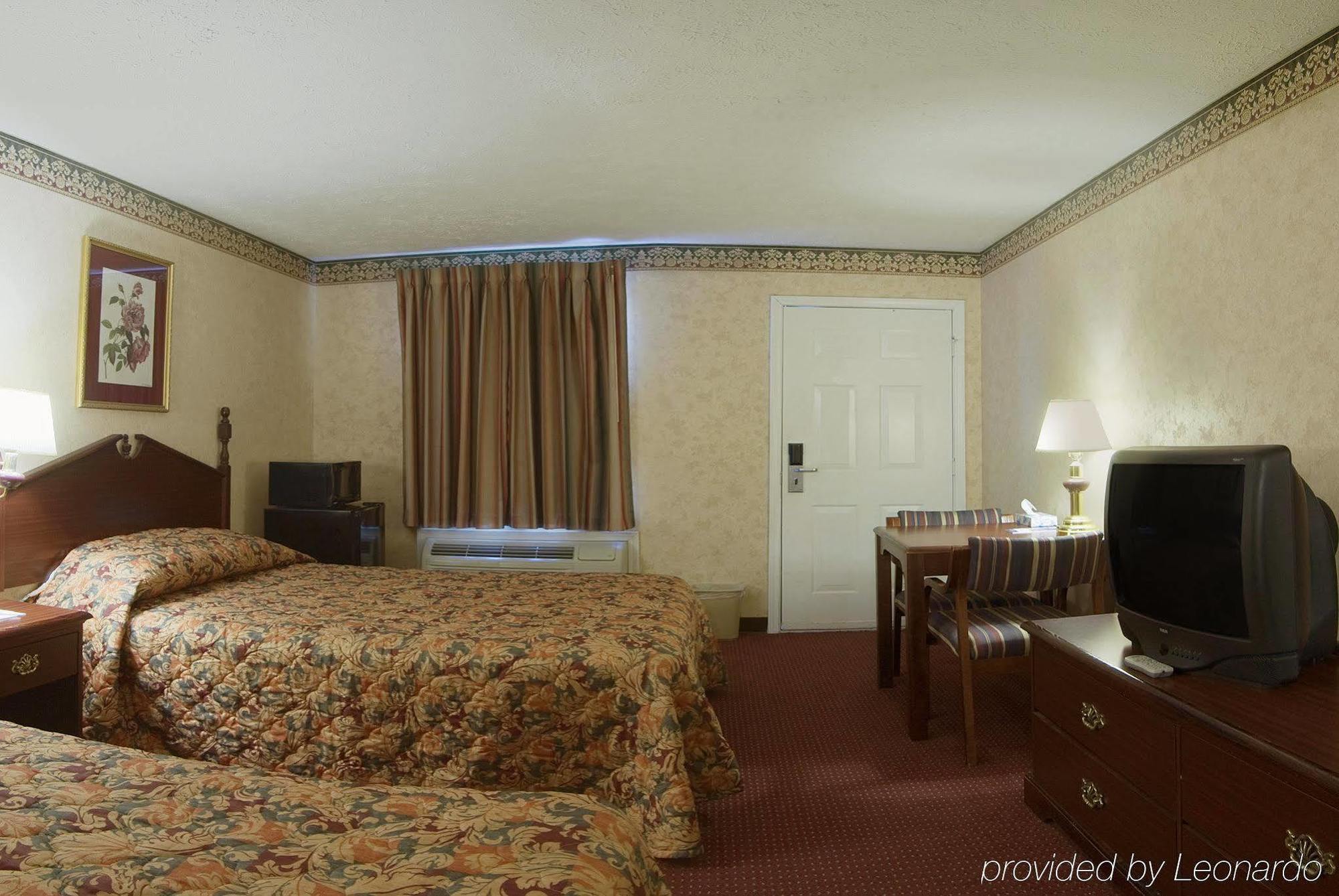 Americas Best Value Inn & Suites Mt. Pleasant Маунт-Плезант Номер фото